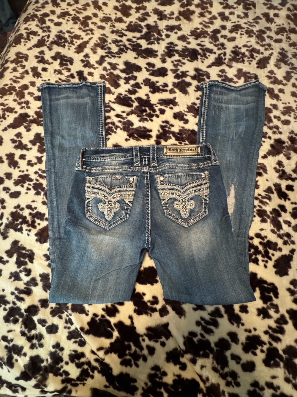 Rock Revival Women's Distressed Blue Boot Cut Jeans with Embellished Pockets